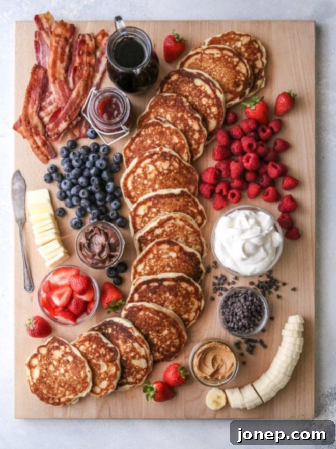 A lavish build-your-own pancake board laden with various toppings like fresh berries, whipped cream, bacon, and syrups, set up for a festive breakfast or brunch.