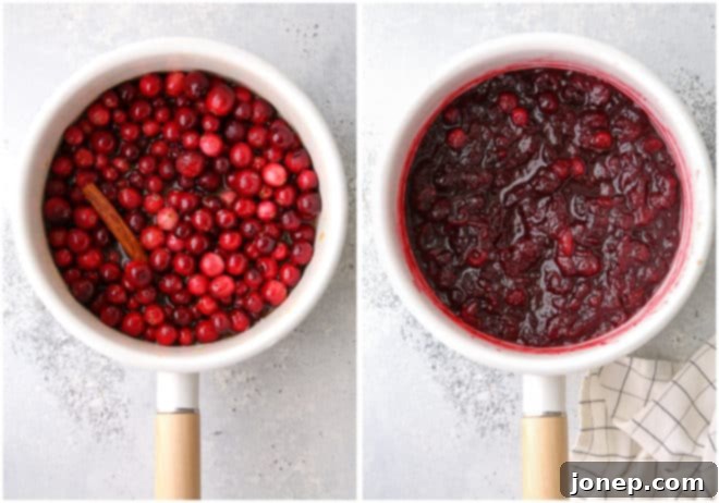 Zesty Spiced Cranberry Relish 4 A saucepan filled with simmering cranberries, brown sugar, orange juice, and spices, bubbling as it cooks on the stovetop.