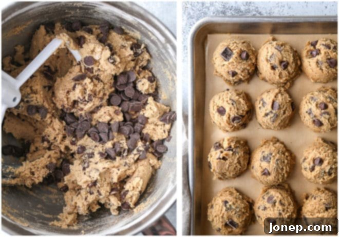 Chai spice chocolate chip cookie dough balls on a baking sheet, ready for baking