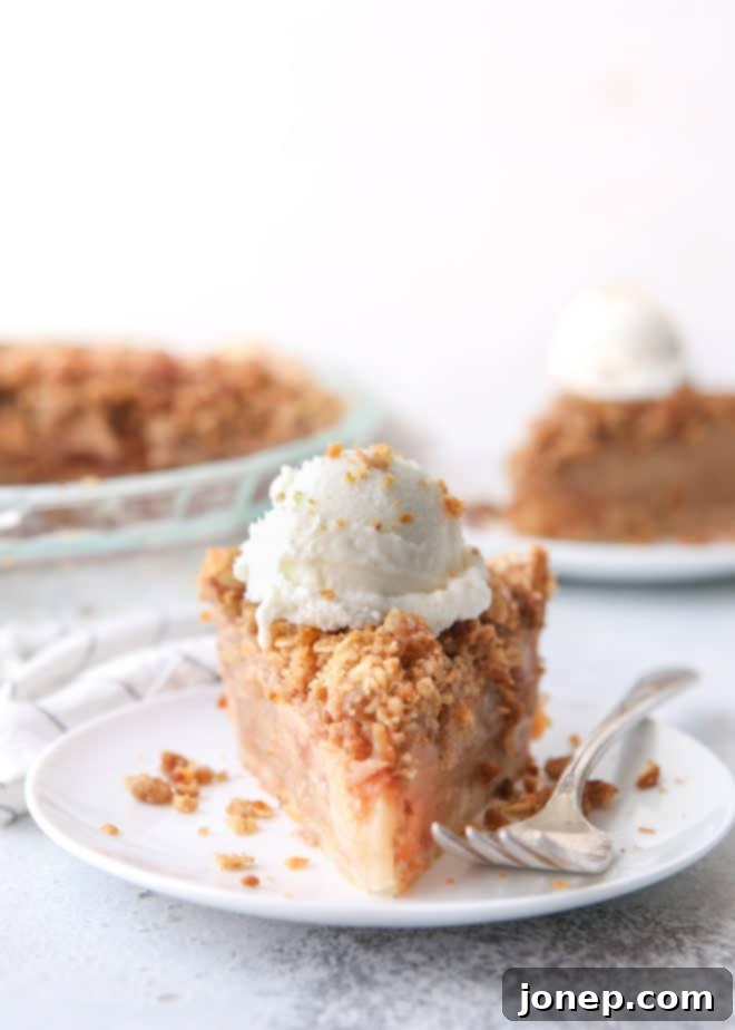 Freshly baked Dutch apple crumb pie, a delicious classic with a twist, ready to be cooled and served