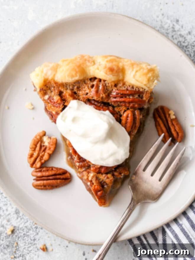 Perfect Classic Pecan Pie 6 pecan pie piece with whipped cream on top