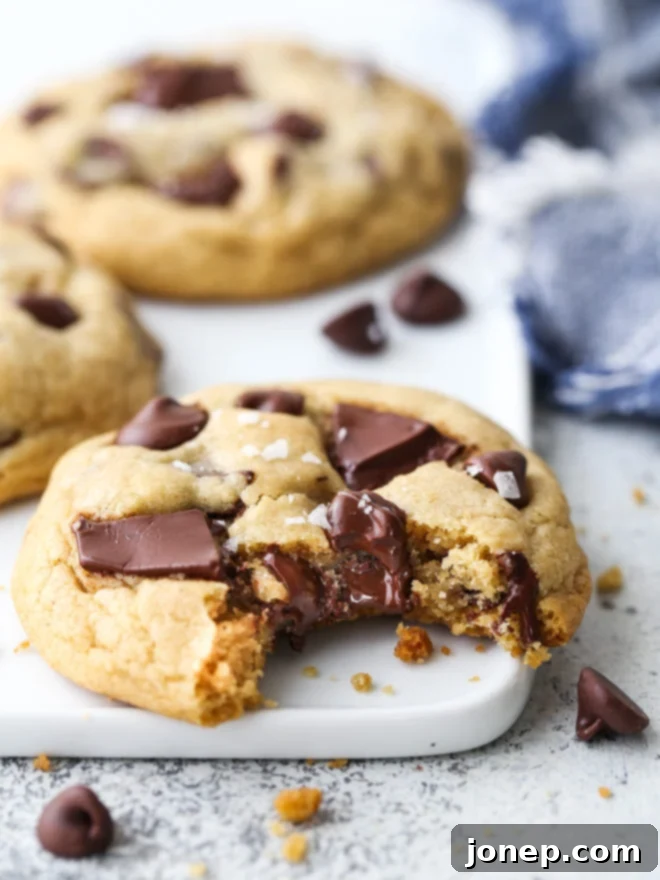 Irresistibly Chewy Chocolate Chip Cookies 8 a stack of the best chocolate chip cookies with a bite taken out of one