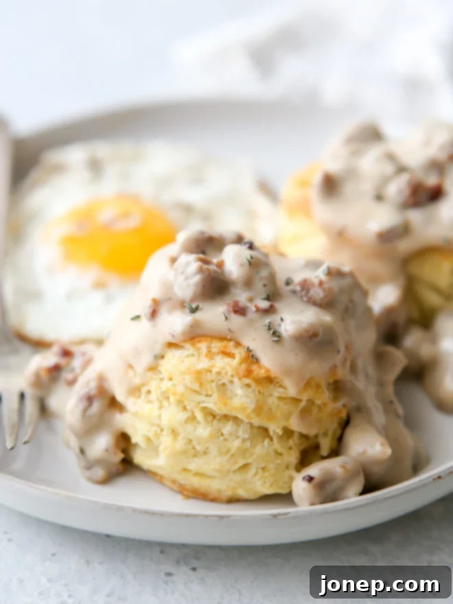 Flaky buttermilk biscuits with homemade sausage gravy is a breakfast no one can resist!