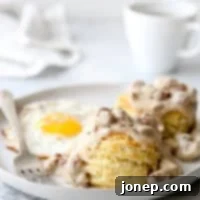 Flaky buttermilk biscuits with homemade sausage gravy is a breakfast no one can resist!