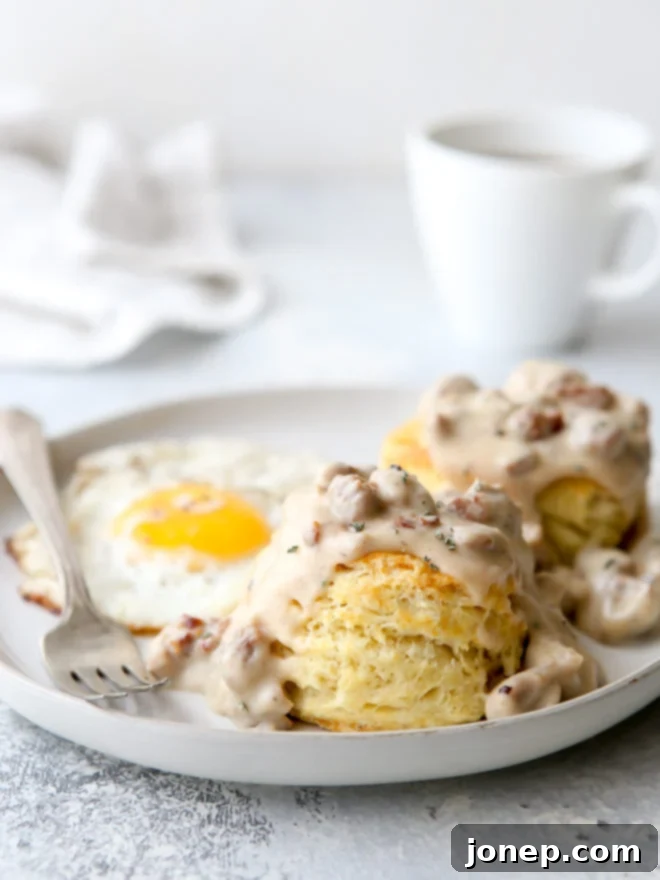 Flaky buttermilk biscuits with homemade sausage gravy is a breakfast no one can resist!