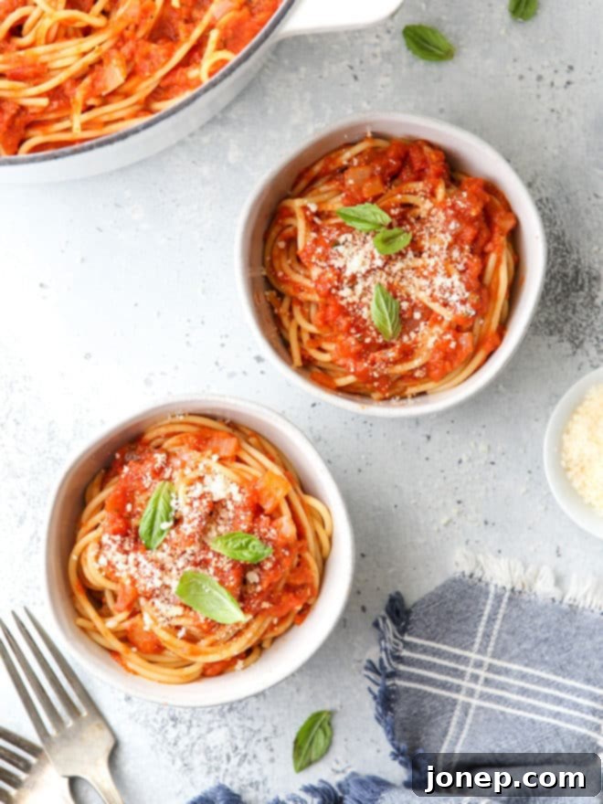This easy homemade marinara sauce is made with simple staple ingredients like canned tomatoes, onion, garlic, and herbs. Use it with pasta, casseroles and more!