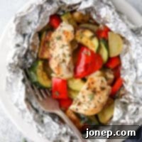 Chicken & Veggie Foil Packet Meals 7 Delicious chicken and veggie tin foil dinners, a complete meal cooked over a fire, on the grill, or in the oven.