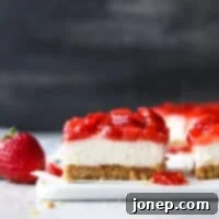 Strawberry Cheesecake Bars: A No-Bake Delight 10 Recipe image for No-Bake Strawberry Cheesecake Bars