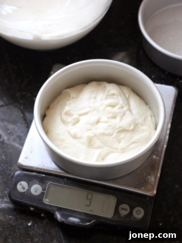 Mastering Flat Cake Layers for Professional Results 2 How to Bake Flat Cake Layers from completelydelicious.com