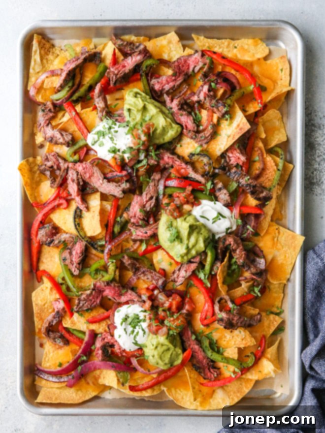 steak fajita nachos on sheet pan