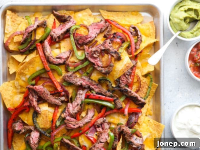 steak fajita nachos with toppings