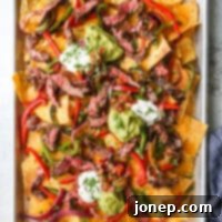 Sizzling Steak Fajita Nachos 8 steak fajita nachos on sheet pan