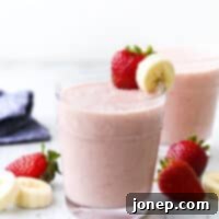 Berry Banana Bliss 7 strawberry banana smoothie in cup with fruit