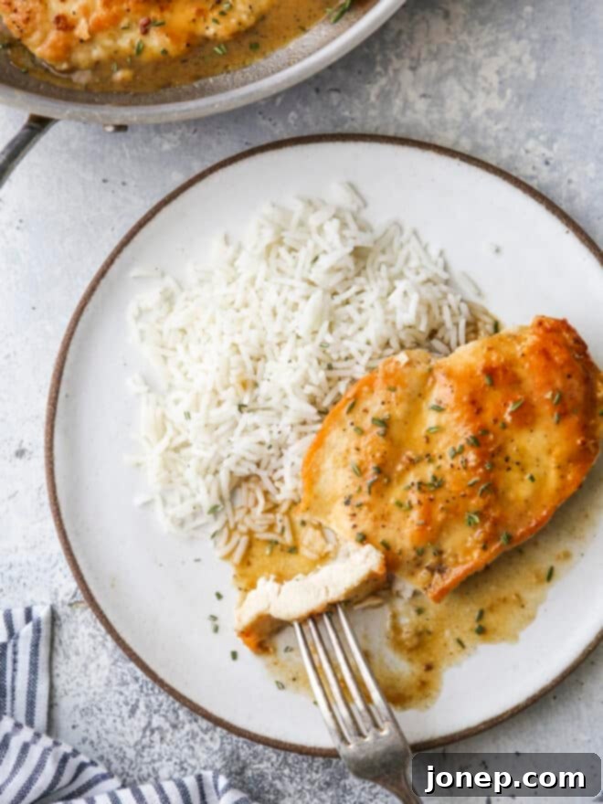 bite of skillet chicken on a fork