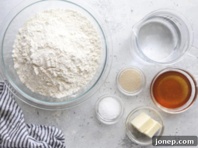 Essential ingredients laid out for making soft white sandwich bread