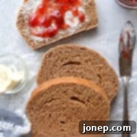 Pillowy White Sandwich Bread 9 This simple and hearty loaf of bread is made with 100% whole wheat flour.