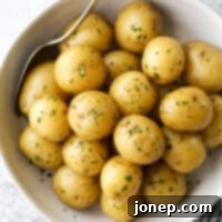 Velvety Buttered Potatoes 7 buttery boiled potatoes in a serving bow