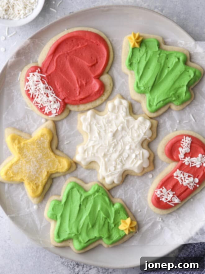 closeup of frosted sugar cookie cut outs on a plate