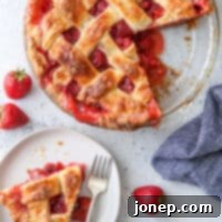 Sweet and Tangy Strawberry Rhubarb Pie 10 strawberry rhubarb pie with a slice on a plate