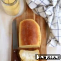 Yeasted Honey Cornbread Loaf, a soft sandwich bread with cornbread flavor.