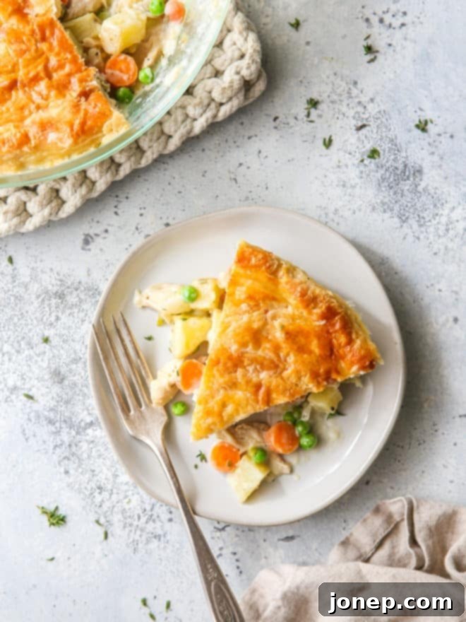 chicken pot pie slice on a plate