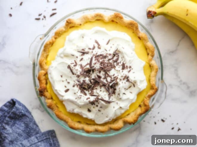 assembled chocolate banana cream pie in pie pan