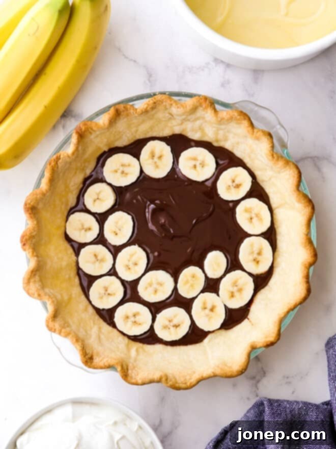 assembling chocolate banana cream pie