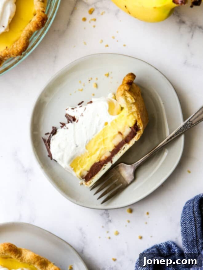 slice of chocolate banana cream pie on a plate