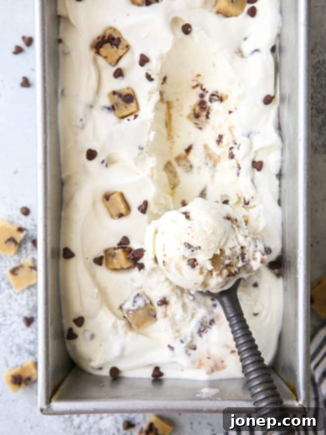 scooping out no-churn chocolate chip cookie dough ice cream