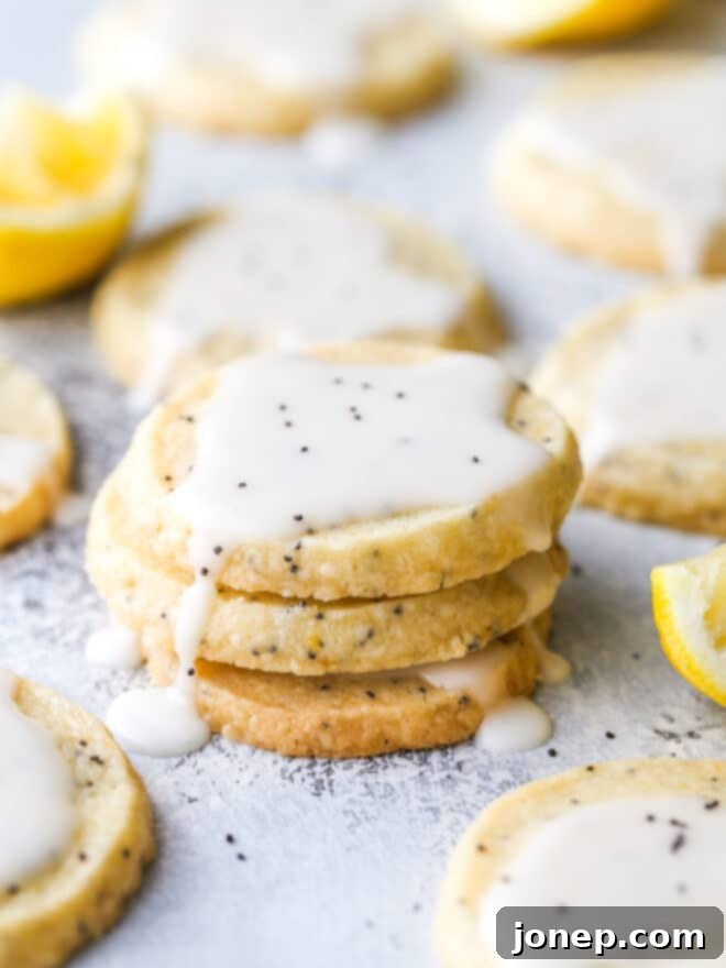 lemon poppy seed shortbread cookies stacked together
