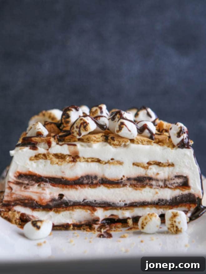 Layers of chocolate pudding, marshmallow whipped cream and graham crackers make up this S'mores Icebox Cake