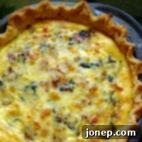 Savory Bacon and Spinach Quiche 2 Close-up of a slice of Bacon and Spinach Quiche