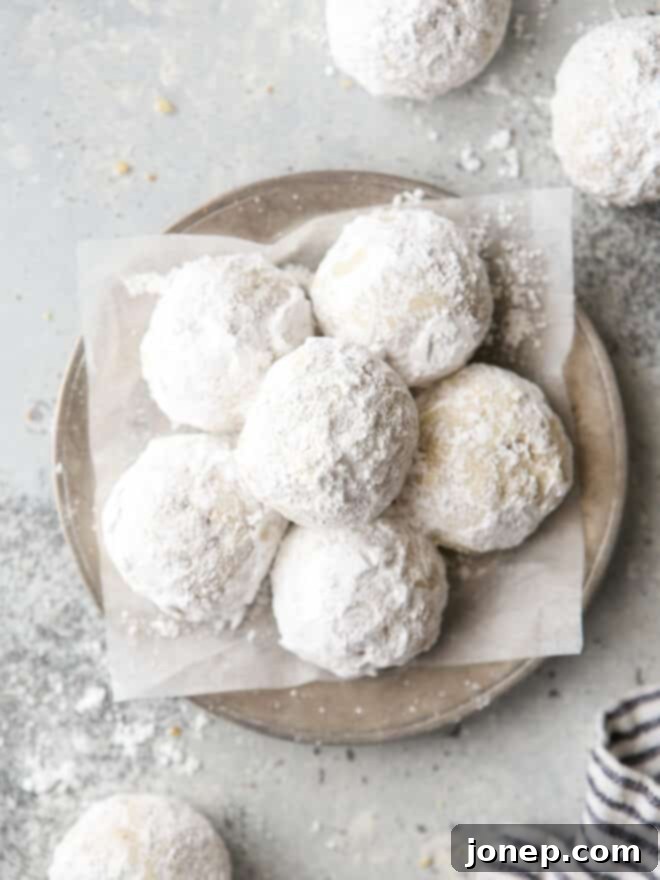 snowball cookies arranged on plate