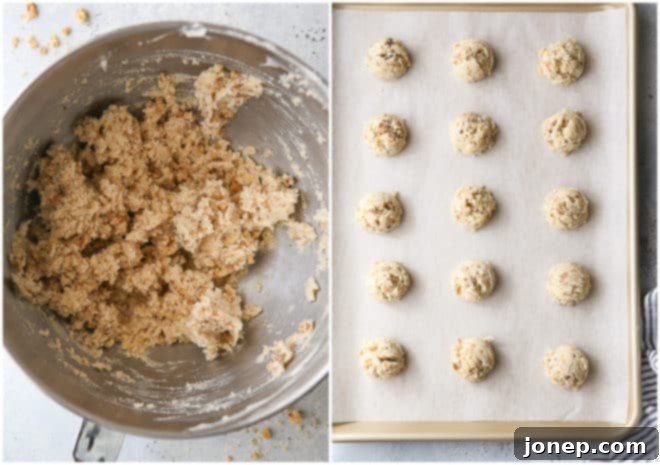 making snowball cookie dough and scooping it onto a cookie sheet