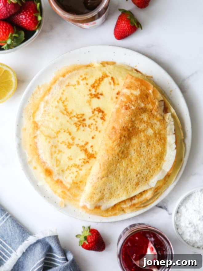 Crafting Perfect Homemade Crepes 7 a stack of homemade crepes on a plate