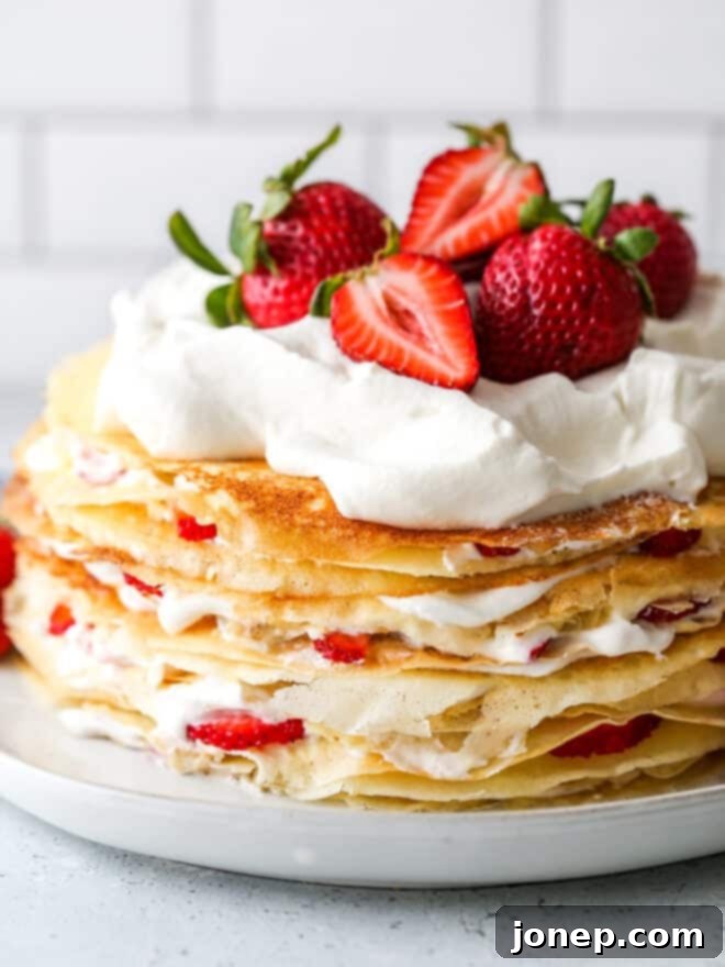 strawberries and cream crepe cake close up