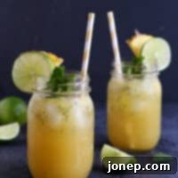 Vibrant Virgin Julep 2 Non-Alcoholic Juicy Julep in a glass with mint