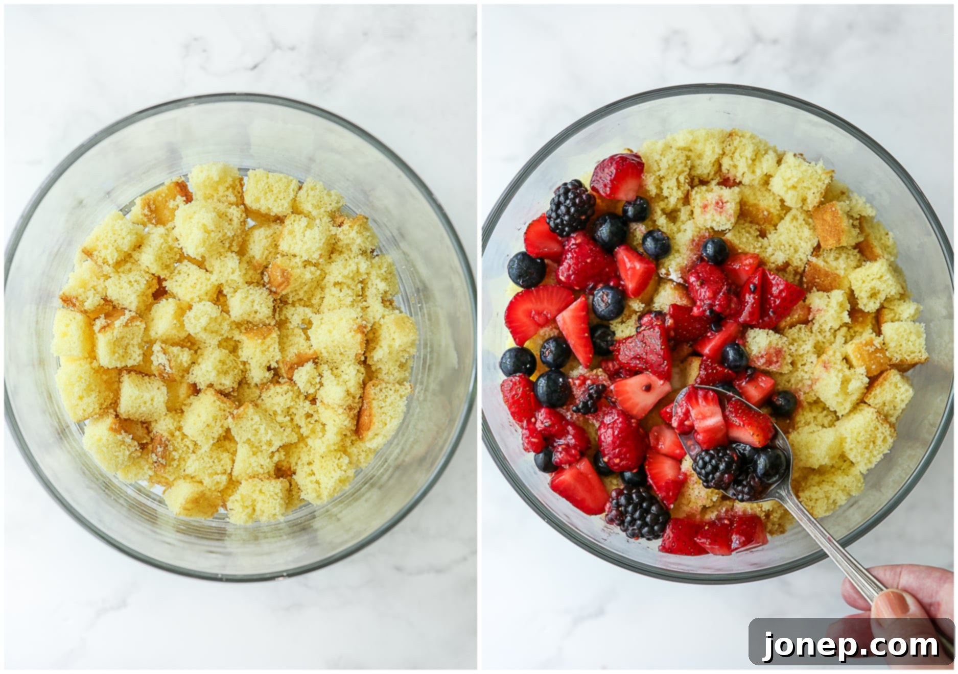 First layer of cake cubes topped with juicy macerated berries.