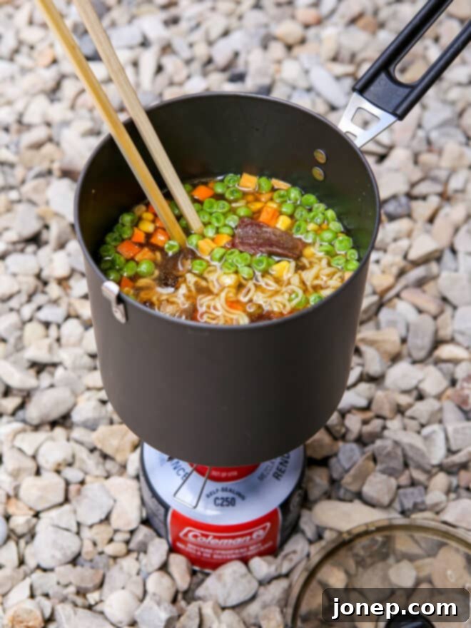 Backpacking Ramen Hacks 7 backpacking ramen soup in pot over camp stove