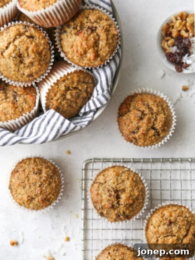 Freshly baked bran muffins with banana, walnuts, coconut, cinnamon and raisins, topped with demerara sugar
