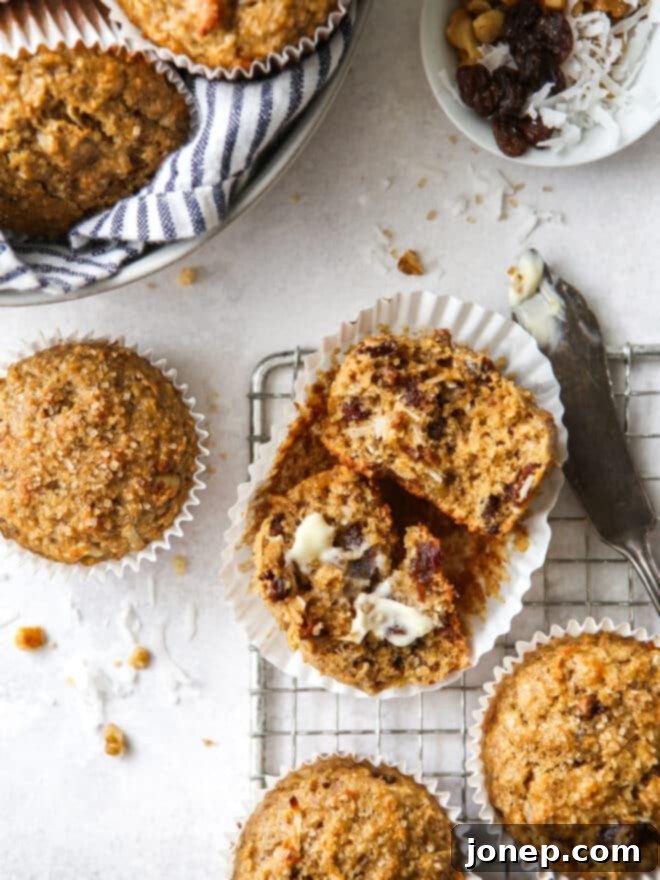 Close-up of freshly baked bran muffins, moist and golden brown, in a muffin pan