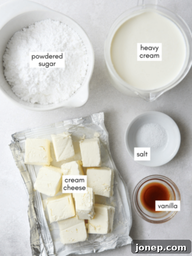 Essential ingredients for homemade Chantilly cream frosting laid out on a surface
