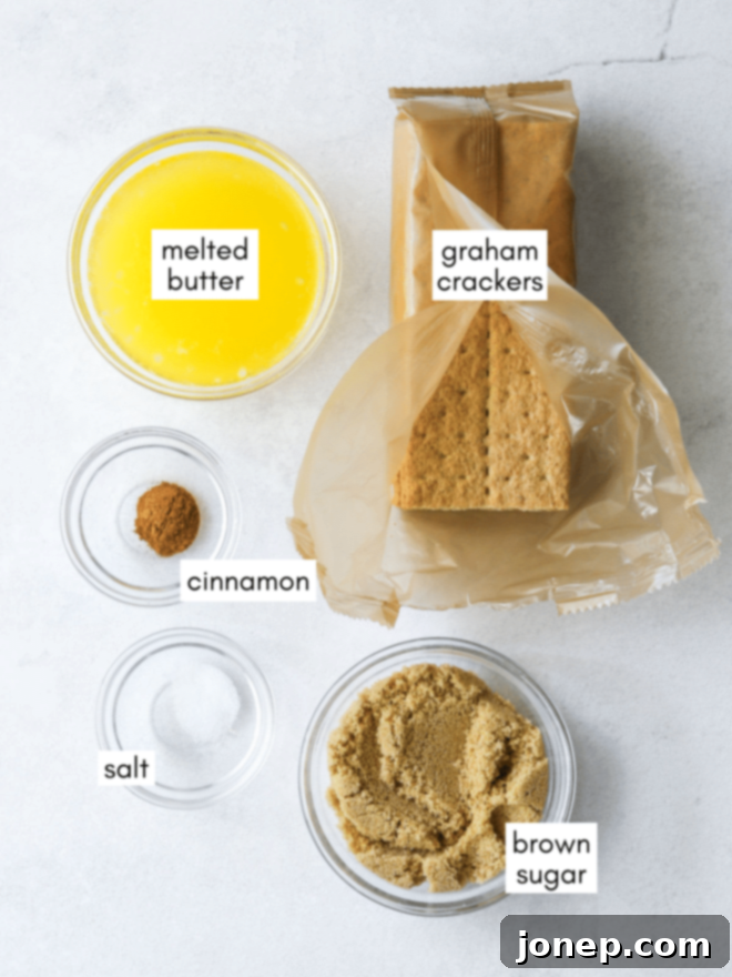 Ingredients for graham cracker crust displayed: graham crackers, brown sugar, melted butter, salt, and cinnamon.