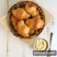 Golden Sweet Potato Crescents with Whipped Honey Butter 2 Sweet Potato Crescent Rolls with Whipped Honey Butter from completelydelicious.com