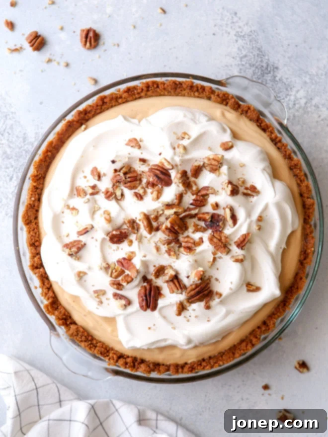 Creamy caramel pudding pie with gingersnap and pecan crust - so decadent and stunning!