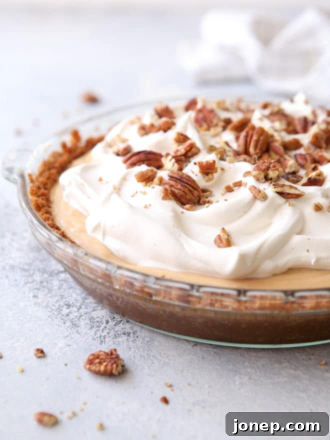 Creamy caramel pudding pie with gingersnap and pecan crust - so decadent and stunning!