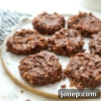 A close-up shot of no-bake chocolate peanut butter oatmeal cookies, highlighting their rich color and chewy texture.