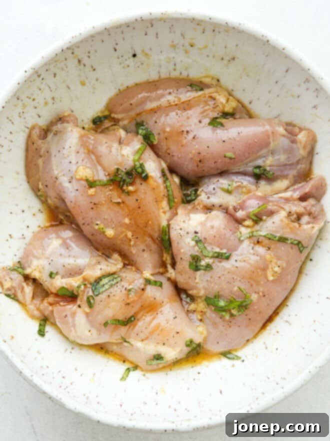chicken thighs in easy marinade in a bowl