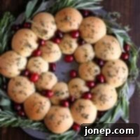 Festive Pull Apart Dinner Roll Centerpiece 2 Holiday Roll Wreath on a wooden board