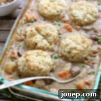 Rustic Beef Pot Pie with Herbed Biscuit Topping 2 Beef Pot Pie with Herbed Biscuits | completelydelicious.com